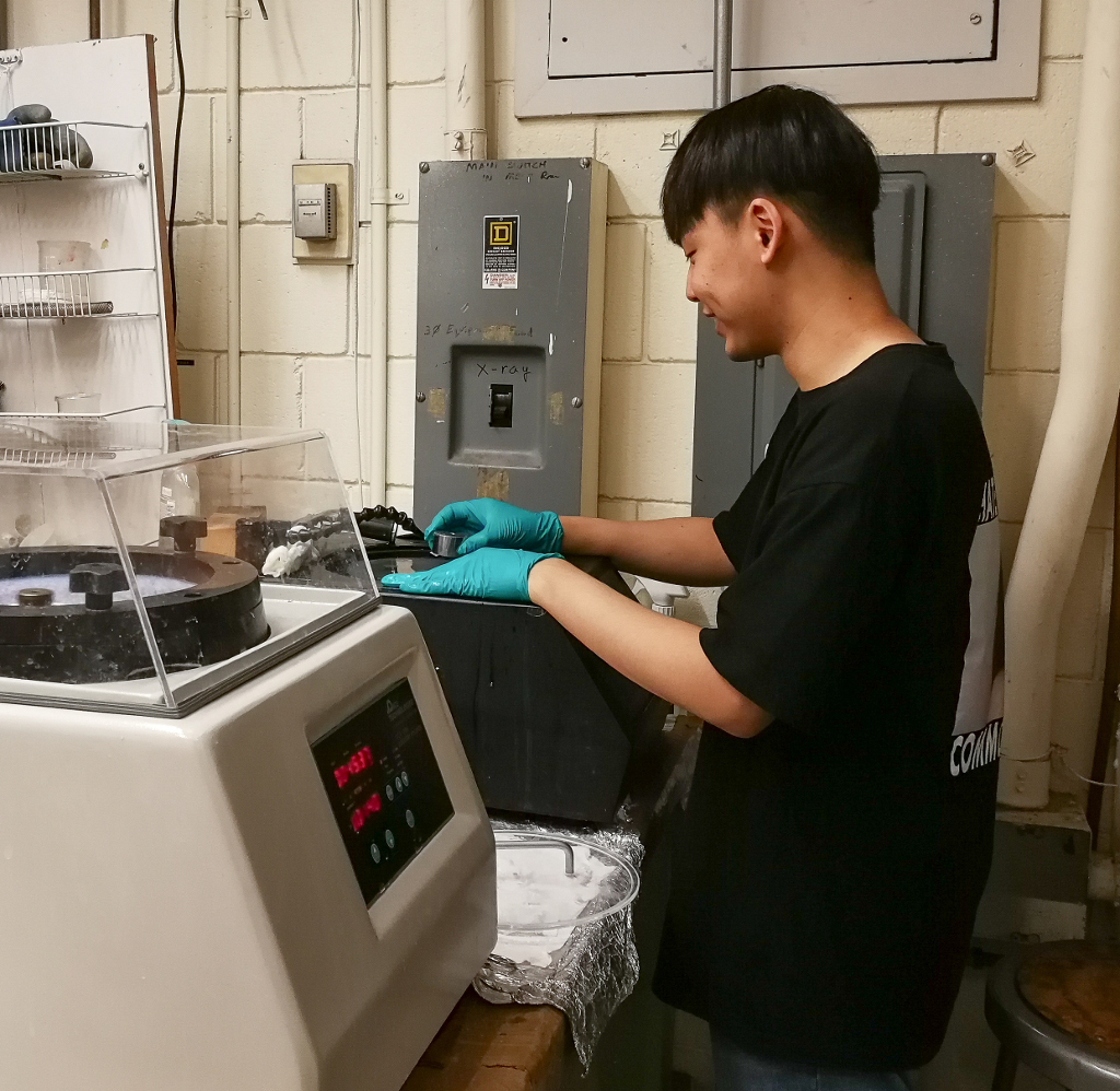 photo of Hyunjae Park using Multiprep polishing System to prepare substrates