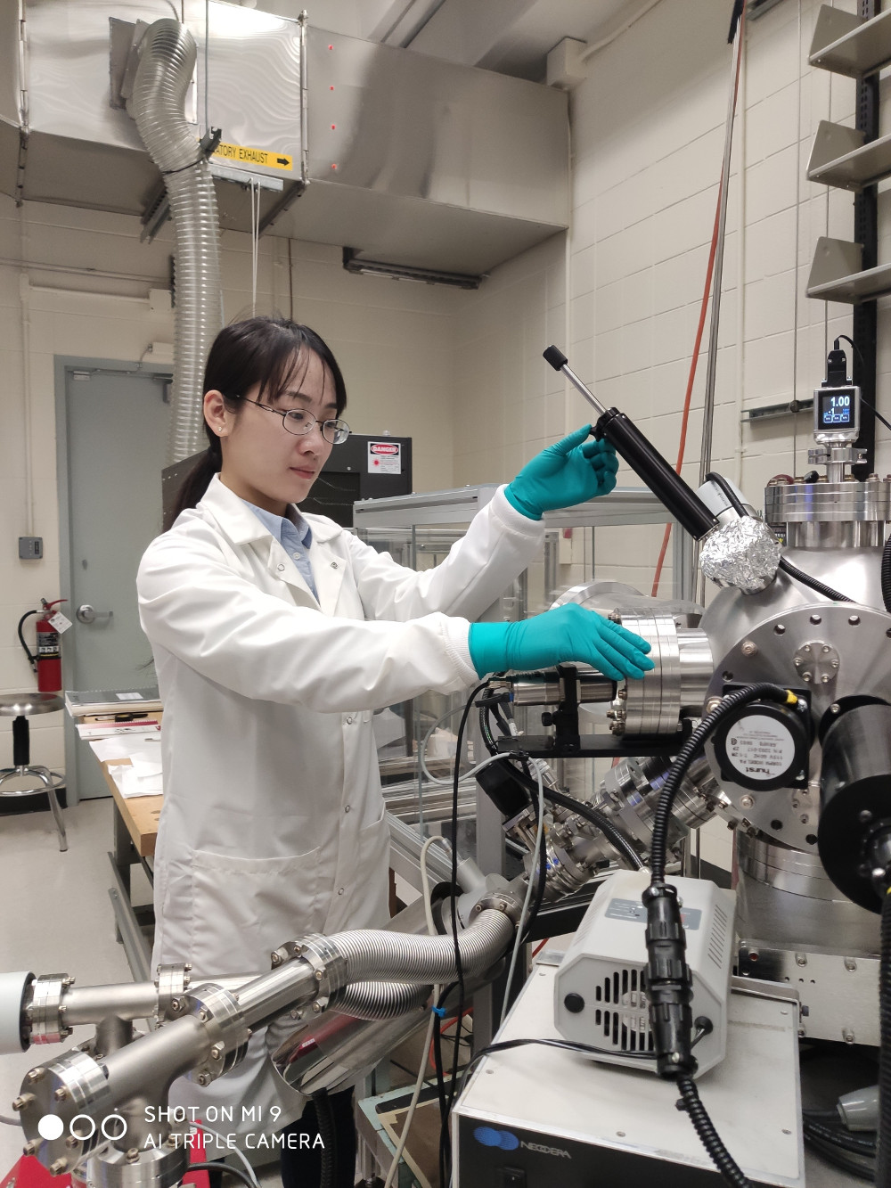 photo of Shanshan Guo growing samples by Pulsed Laser Deposition (May. 2019)