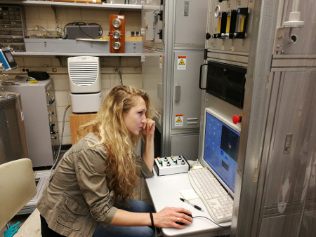 photo of Olga Maximova growing samples using a laser-heated floating zone furnace April 2018